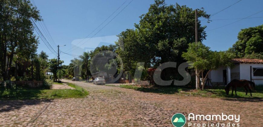 0360 TERRENO EN LAMBARÉ, ZONA COLEGIO SEK