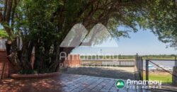 0406 CASA A ORILLAS DEL RÍO PARAGUAY, BARRIO ITÁ ENRAMADA
