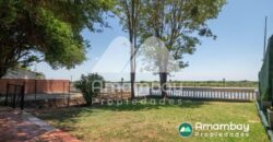 0406 CASA A ORILLAS DEL RÍO PARAGUAY, BARRIO ITÁ ENRAMADA