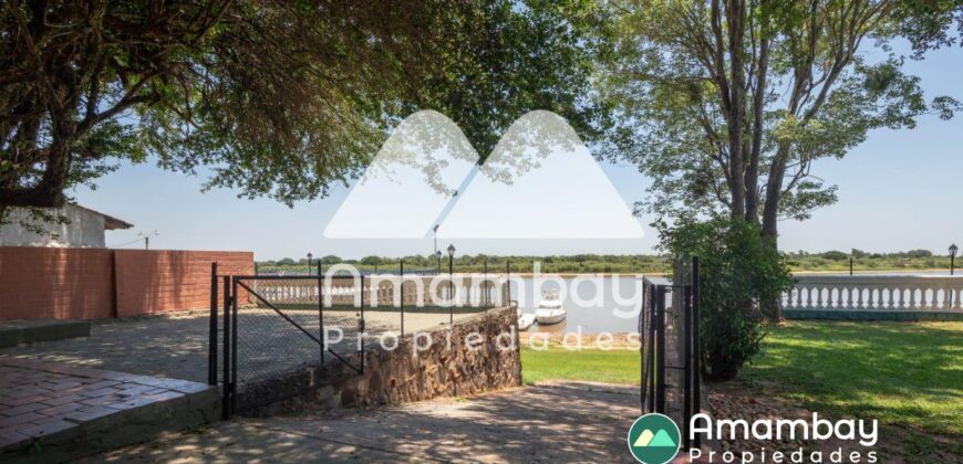 0406 CASA A ORILLAS DEL RÍO PARAGUAY, BARRIO ITÁ ENRAMADA
