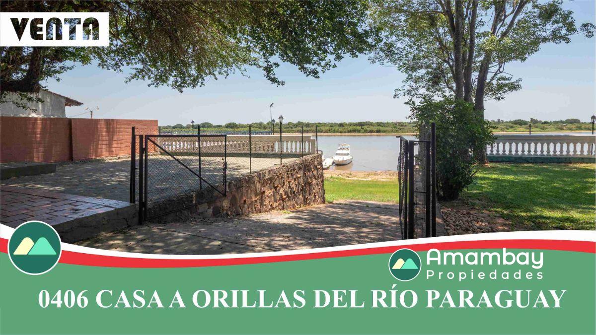 0406 CASA A ORILLAS DEL RÍO PARAGUAY, BARRIO ITÁ ENRAMADA