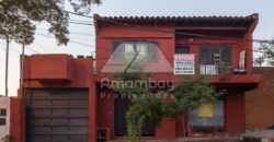 0475 CASA CON SALÓN COMERCIAL EN LAMBARÉ, BARRIO SANTA ROSA